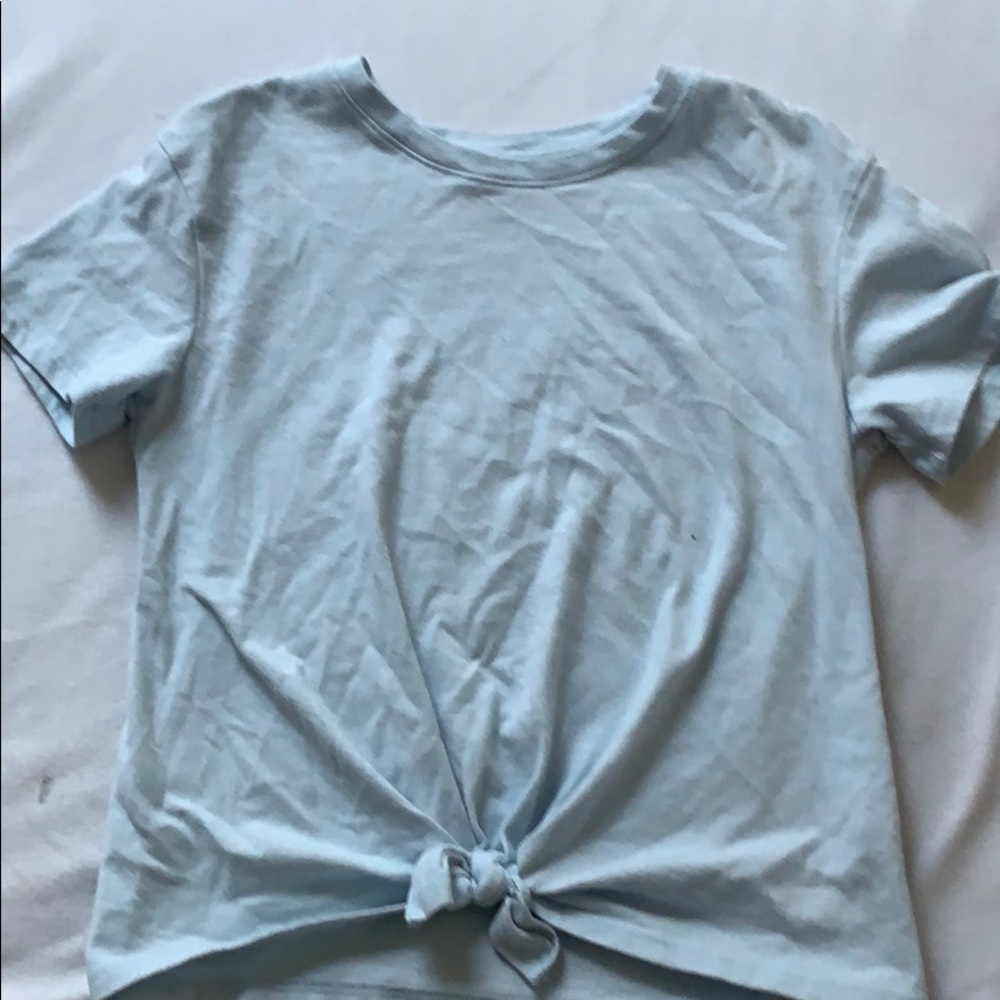 art class tied baby blue shirt